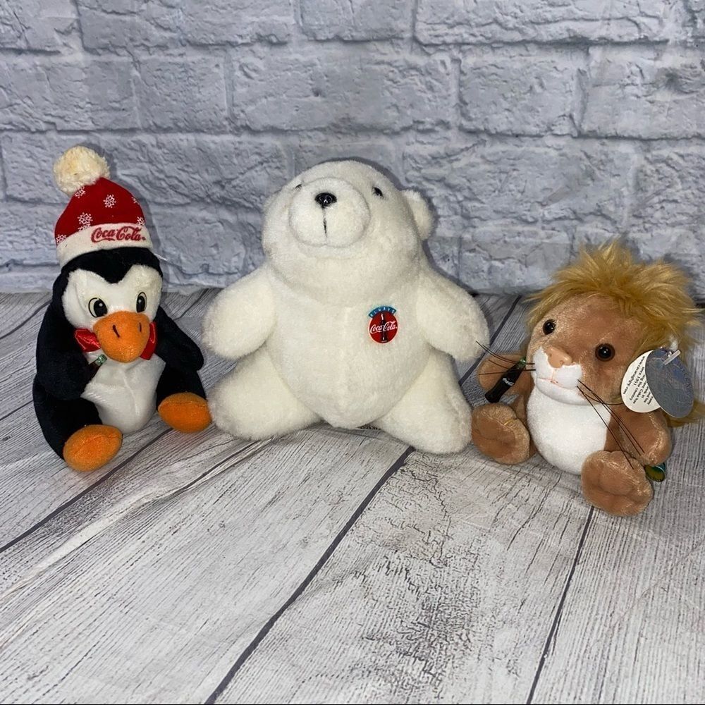 Coca Cola collectibles small plush animals polar bear penguin and lion